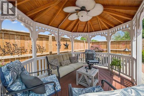 Octagonal white gazebo featuring a wood-finish vaulted ceiling with a ceiling fan - 574 Sprucehill Avenue, Waterloo, ON - Outdoor With Deck Patio Veranda With Exterior