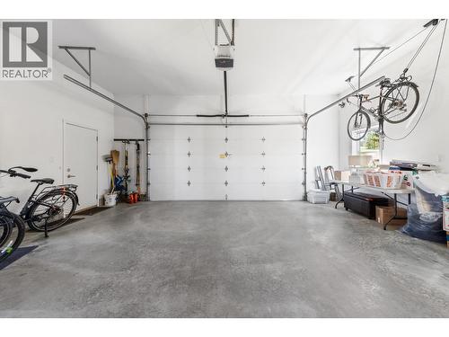Double attached garage - 3990 June Springs Road, Kelowna, BC - Indoor Photo Showing Garage