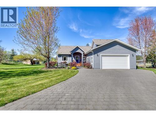 3990 June Springs Road, Kelowna, BC - Outdoor With Facade