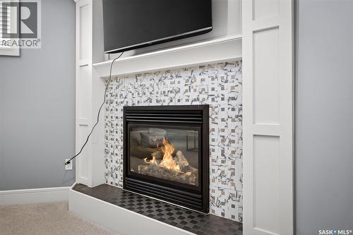 A 269 High Street E, Moose Jaw, SK - Indoor Photo Showing Living Room With Fireplace