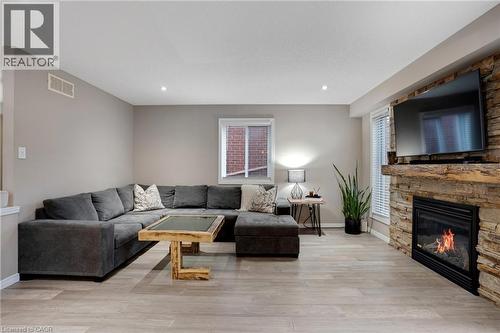 99 Udvari Crescent, Kitchener, ON - Indoor Photo Showing Living Room With Fireplace