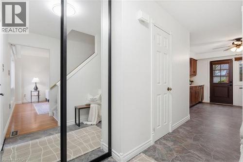 Entryway featuring a full-length mirrored closet door - 56 Angela Crescent, Cambridge, ON - Indoor Photo Showing Other Room