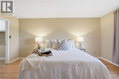 Primary bedroom featuring neutral wall tones and light wood-finish flooring - 56 Angela Crescent, Cambridge, ON - Indoor Photo Showing Bedroom