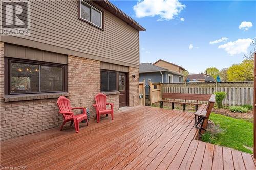 Expansive wood-finish deck with integrated seating - 56 Angela Crescent, Cambridge, ON - Outdoor With Deck Patio Veranda With Exterior