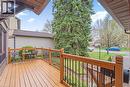 Spacious wood-finish deck with black metal balusters and wood railings - 56 Angela Crescent, Cambridge, ON  - Outdoor With Deck Patio Veranda With Exterior 