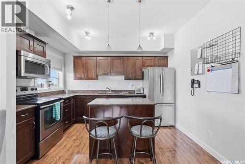 101 110 Hampton Circle, Saskatoon, SK - Indoor Photo Showing Kitchen With Stainless Steel Kitchen With Upgraded Kitchen