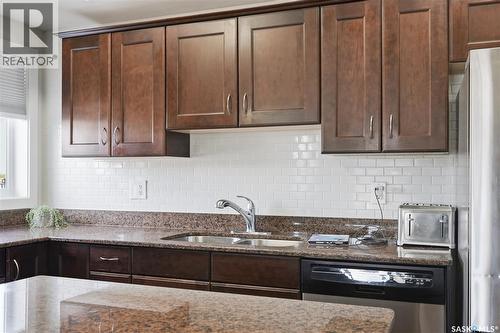 101 110 Hampton Circle, Saskatoon, SK - Indoor Photo Showing Kitchen With Double Sink With Upgraded Kitchen