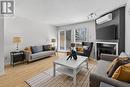 211 Briston Private, Ottawa, ON  - Indoor Photo Showing Living Room With Fireplace 