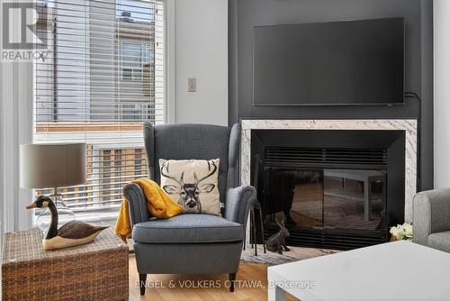 211 Briston Private, Ottawa, ON - Indoor Photo Showing Living Room With Fireplace