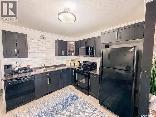 509 1303 Richardson Road, Saskatoon, SK - Indoor Photo Showing Kitchen With Double Sink