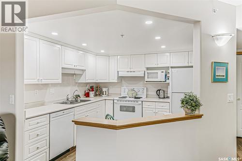 329 2530 25Th Avenue, Regina, SK - Indoor Photo Showing Kitchen With Double Sink