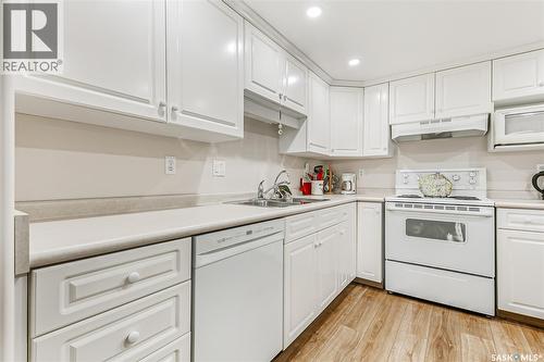 329 2530 25Th Avenue, Regina, SK - Indoor Photo Showing Kitchen With Double Sink