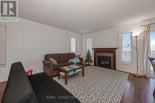 323 Freedom Private, Ottawa, ON - Indoor Photo Showing Living Room With Fireplace