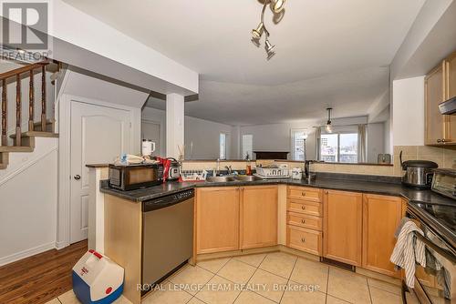 323 Freedom Private, Ottawa, ON - Indoor Photo Showing Kitchen With Double Sink