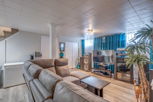 Salle familiale - 626 Rue Lapointe, Saint-Jérôme, QC - Indoor Photo Showing Living Room