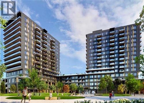 Modern multi-story buildings featuring dark paneling and extensive window lines - 4878 Powers Common Unit# 301, Burlington, ON - Outdoor With Balcony With Facade