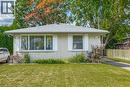 White brick facade with a light grey shingle roof - 179 Vancouver Street, London, ON  - Outdoor 