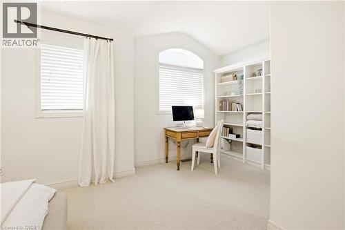 Bright interior space with soft neutral carpeting and white wall finishes - 129 Magnificent Way, Binbrook, ON - Indoor