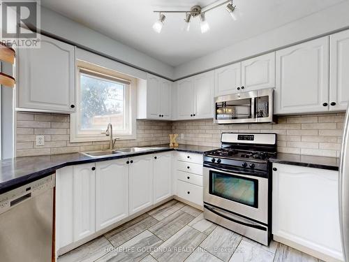 39 Etherington Crescent, Barrie, ON - Indoor Photo Showing Kitchen With Double Sink