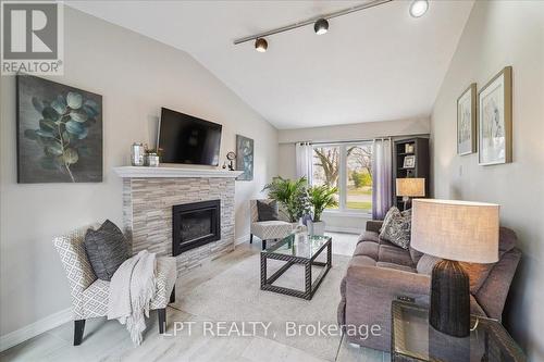 26 Wright Crescent S, Caledon, ON - Indoor Photo Showing Living Room With Fireplace