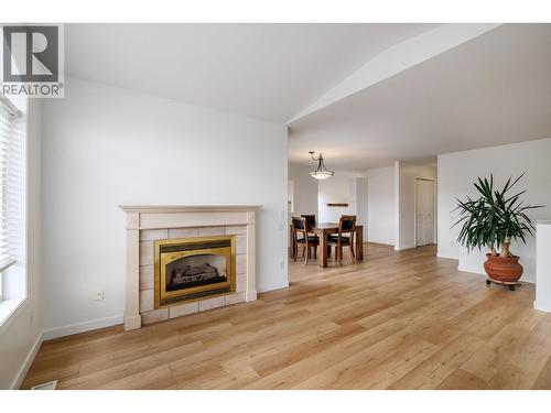 2325 Silver Place Unit# 24 Lot# 24, Kelowna, BC - Indoor Photo Showing Living Room With Fireplace
