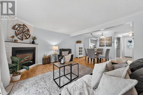 111 Connelly Drive, Kitchener, ON - Indoor Photo Showing Living Room With Fireplace