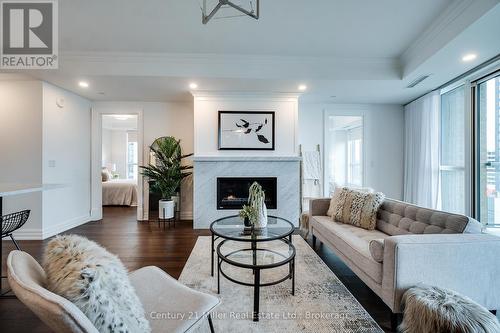 802 - 2060 Lakeshore Road, Burlington (Brant), ON - Indoor Photo Showing Living Room With Fireplace