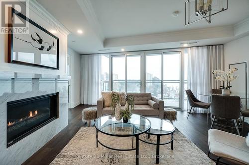 802 - 2060 Lakeshore Road, Burlington (Brant), ON - Indoor Photo Showing Living Room With Fireplace