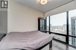 Expansive floor-to-ceiling window offering cityscape scenery - 