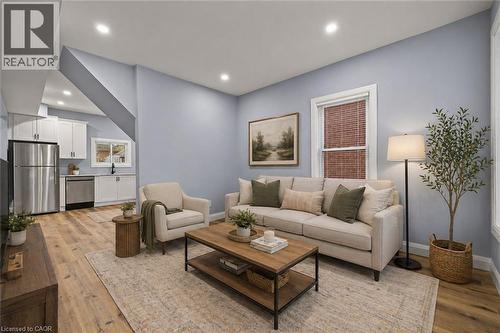 virtually staged - 24 East 24Th Street, Hamilton, ON - Indoor Photo Showing Living Room