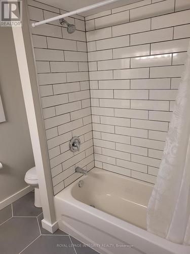 basement apartment tiled shower - 2748 Moncton Road, Ottawa, ON - Indoor Photo Showing Bathroom