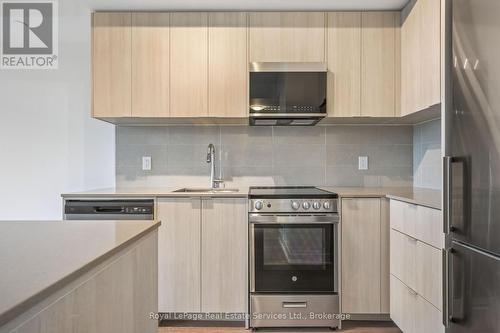 711 - 2088 James Street, Burlington (Brant), ON - Indoor Photo Showing Kitchen With Upgraded Kitchen