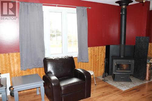 237 Main Road, Piccadilly, NL - Indoor Photo Showing Living Room With Fireplace