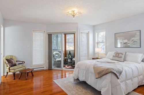 1-9875 Third St, Sidney, BC - Indoor Photo Showing Bedroom