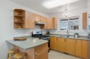 1-9875 Third St, Sidney, BC  - Indoor Photo Showing Kitchen With Double Sink 