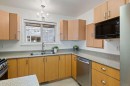 1-9875 Third St, Sidney, BC  - Indoor Photo Showing Kitchen With Double Sink 