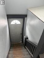 Entrance to upstairs units. - 