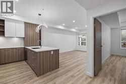 Kitchen, Dining & Living. Photos may be of a similar home in the condo community. - 