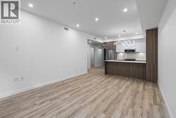 Kitchen, Dining & Living. Photos may be of a similar home in the condo community. - 