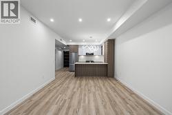 Kitchen, Dining & Living. Photos may be of a similar home in the condo community. - 