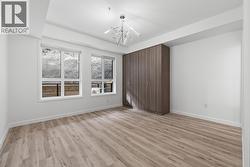 Primary Bedroom. Photos may be of a similar home in the condo community. - 
