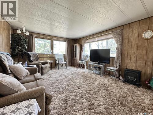 237 Amy Avenue, Alice Beach, SK - Indoor Photo Showing Living Room With Fireplace