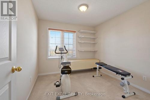 67 Hawktree, Ottawa, ON - Indoor Photo Showing Gym Room