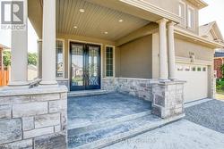 Covered, stamped concrete porch. - 