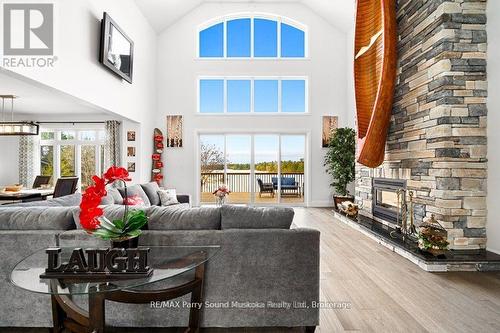 730 124 Highway, Mckellar, ON - Indoor Photo Showing Living Room With Fireplace