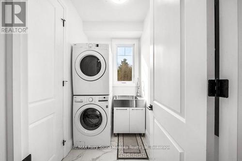 Main Floor Laundry - 730 124 Highway, Mckellar, ON - Indoor Photo Showing Laundry Room