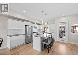 Featuring a kitchen island with room for 3 stools - 