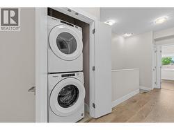 Front loading washer and dryer in hallway closet - top floor - 
