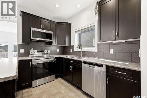 3644 Green Moss Lane, Regina, SK - Indoor Photo Showing Kitchen With Double Sink