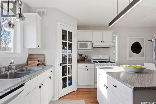 719 Rutherford Lane, Saskatoon, SK - Indoor Photo Showing Kitchen With Double Sink